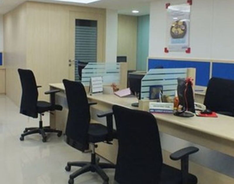 Modern corporate office workstation layout with desks and swivel chairs ready for commercial relocation in Dubai